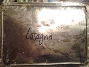 A small foil pan of lasagna